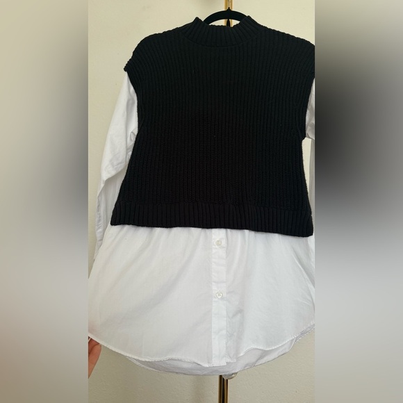 Calvin Klein black sweater vest layered over white long-sleeve button-down shirt - Picture 2 of 7
